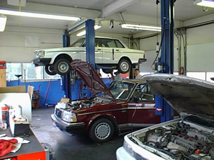 An image of a car on a hoist